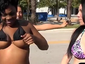 Ebony and white babes exposed their nice tits for cash