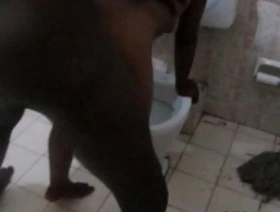 African amateur friends have sex in toilet